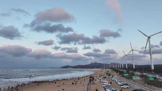 航拍威海布鲁威斯号海边海鸥晚霞延时云