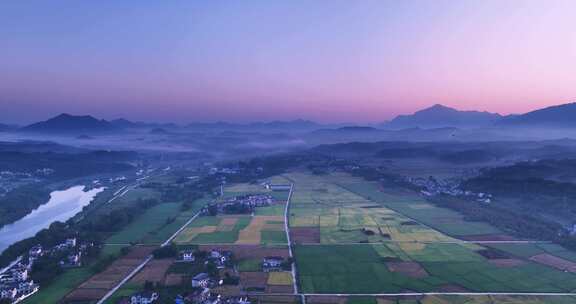 航拍山村秋天日出薄雾美景