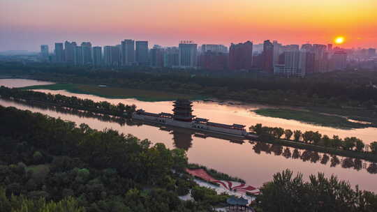 临汾汾河公园航拍延时 城市地标萱楼日出