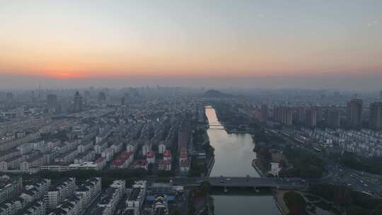 4K航拍昆山城市冬日日落风光建筑大景