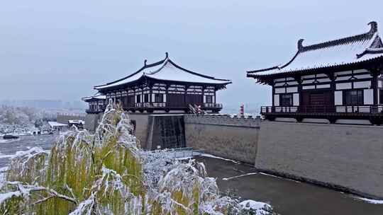 航拍洛阳定鼎门雪景视频素材模板下载