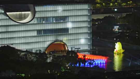 上海嘉定新城上海保利大剧院夜晚水景光影秀视频素材模板下载