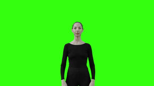 用手指画多个绿色屏幕虚拟方块的女人。