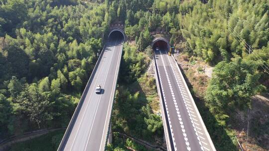 高速公路汽车进出隧道航拍高架桥货车高速路视频素材模板下载