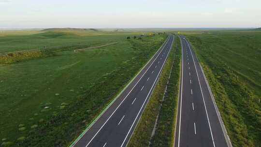 航拍内蒙草原公路风车