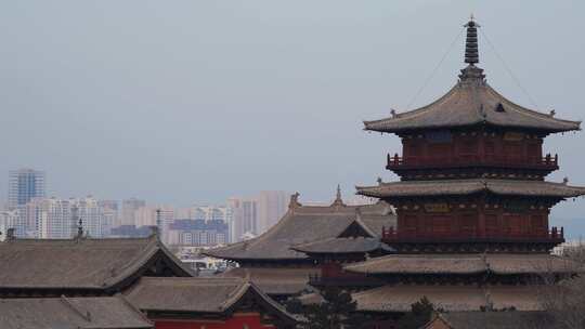 大同华严寺古建筑塔楼与现代建筑相映成趣