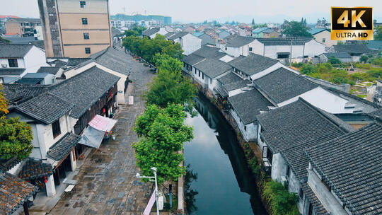 江南水乡古镇风光航拍小桥流水乌篷船老店