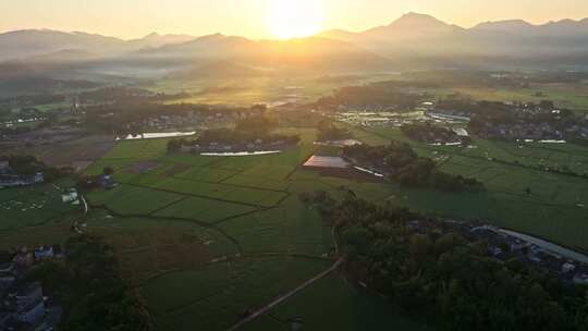 中国侨乡广东台山乡村稻田山脉山峰日出航拍