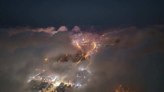 航拍威海市环翠区平流雾幸福门城市夜景