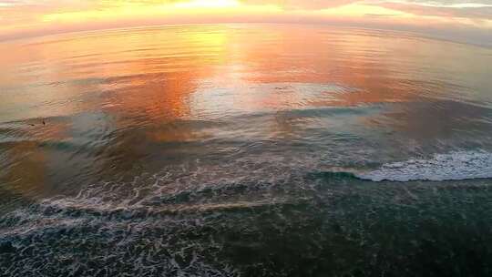 航拍海上日出延时日落海浪