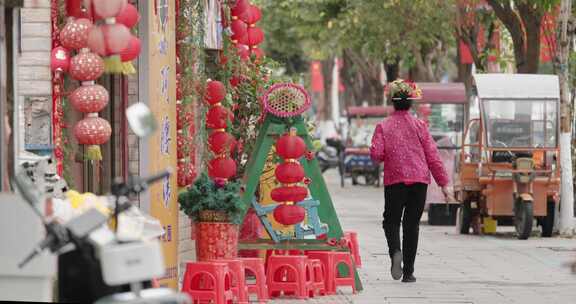 福建泉州蟳埔簪花闽南文化装饰中年妇女背影