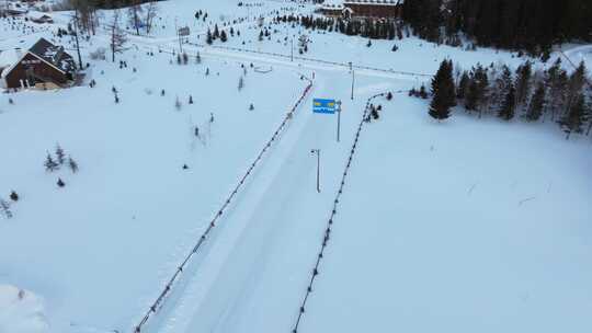 航拍新疆冬季喀纳斯湖雪景雪山森林冰河寒冷