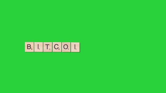 绿幕背景上的bitcoin木块单词定格动画