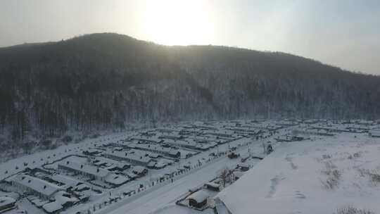 4K航拍东北威虎山雪乡村冰雪旅游马拉爬犁