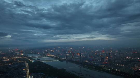 城市航拍洛阳阴雨天后城市云海夜景建筑