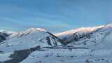 新疆阿勒泰地区禾木风景区雪山自然风光高清在线视频素材下载