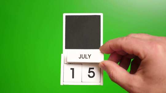 07.绿色背景上日期为7月15日的日历。视频素材模板下载