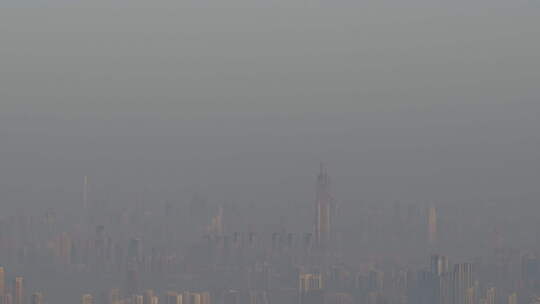 航拍武汉东湖公园清晨大雾城市建筑远景