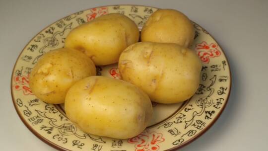 土豆特写马铃薯洋芋有机蔬菜旋转