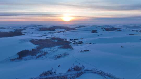 大兴安岭自然风景丘陵山地雪野夕阳