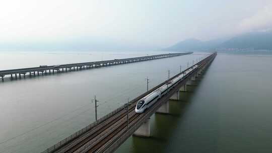 高铁驶过城市跨江大桥视频素材模板下载