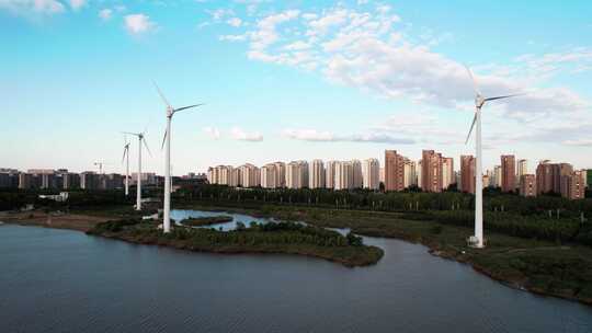 河堤河道旁风力发电机组城市风光自然风景