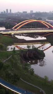 竖版航拍湖南衡阳陆家新区城市夜景观光桥