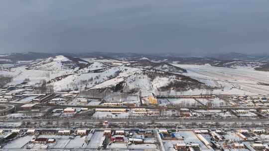 航拍内蒙古冬季村庄雪景视频素材模板下载