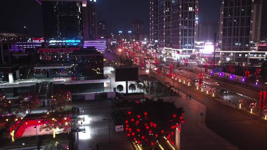 新春佳节夜景商业街高铁站航拍
