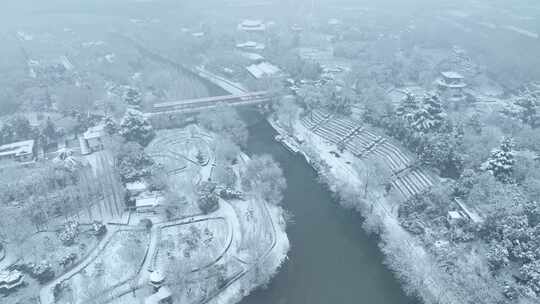 航拍洛阳王城公园雪景视频素材模板下载