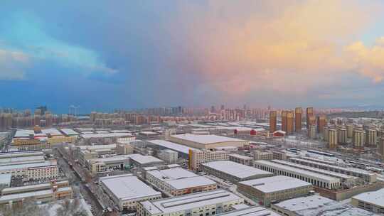 冬季航拍烟台大雪后的城市建筑和晚霞风景