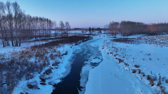 扎敦河湿地不冻河暮色雪景