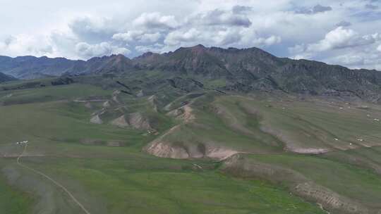 航拍新疆赛里木湖风景区北麓山坡夏季风景