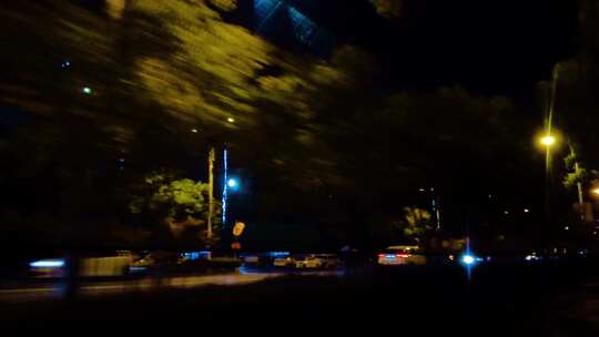 夜晚马路路灯汽车窗外的风景视频素材