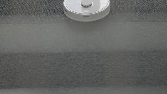 吸尘器清洁地毯的大角度拍摄视频素材模板下载
