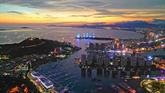 海南三亚三亚湾日落自贸港城市夜景唯美