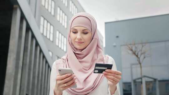 女商人，阿拉伯语，信用卡，手机