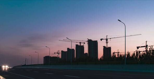 城市建设城市发展工地延时夕阳剪影