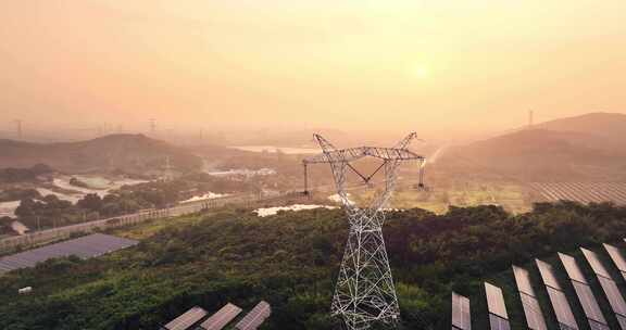 航拍光伏基地日出山顶太阳能板