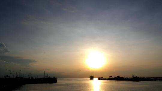 航拍夕阳下的海港码头视频素材模板下载