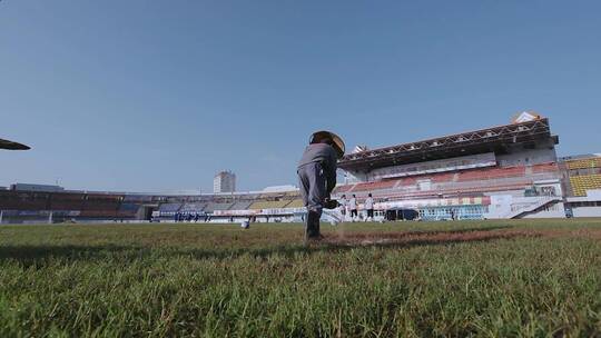 体育场视频云南德宏芒市足球场草地维护视频素材模板下载