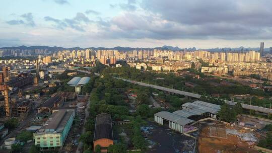 航拍城市雨后烟囱、云、建筑群