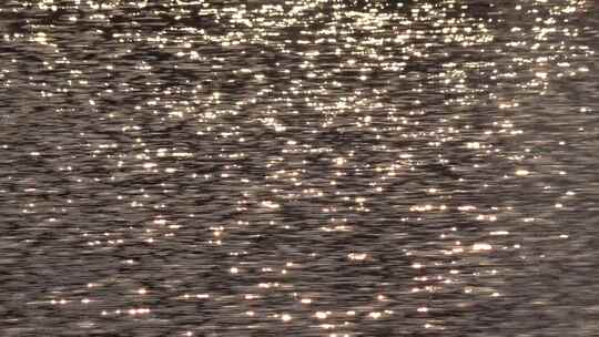 4K唯美夕阳下水面波光粼粼星光闪烁视频素材模板下载