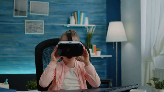 小女生使用VR眼镜进行虚拟现实学习