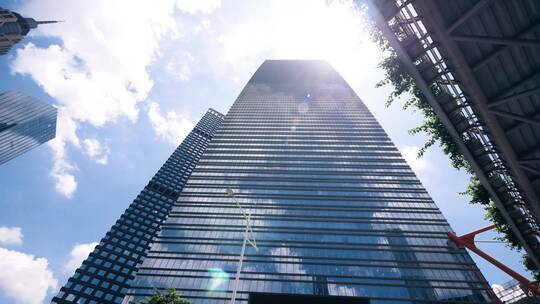 蓝天白云下的城市高楼大厦4k视频素材