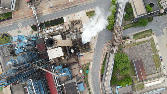 航拍城市环保工业园化工工厂烟囱与设备