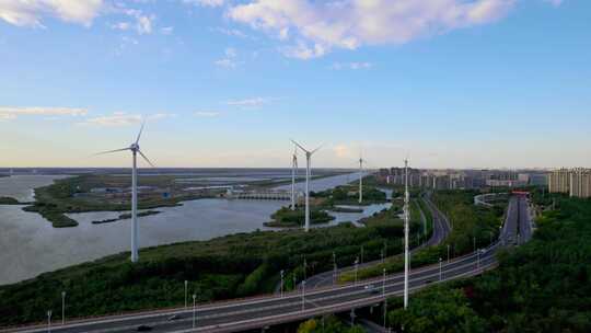 河堤河道旁风力发电机组城市风光自然风景