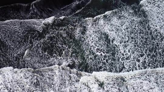 4k航拍鸟瞰冰岛黑沙滩海浪特写