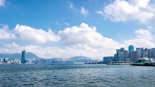 香港九龙半岛尖沙咀城市天际线白天延时视频素材模板下载