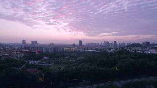 广州番禺城市高楼建筑与夕阳晚霞火烧云航拍